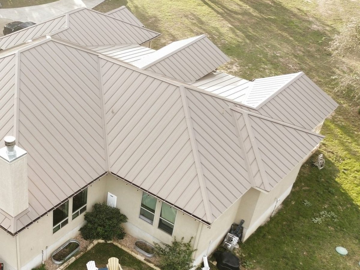 Standing seam metal roof installation in the Texas Hill Country